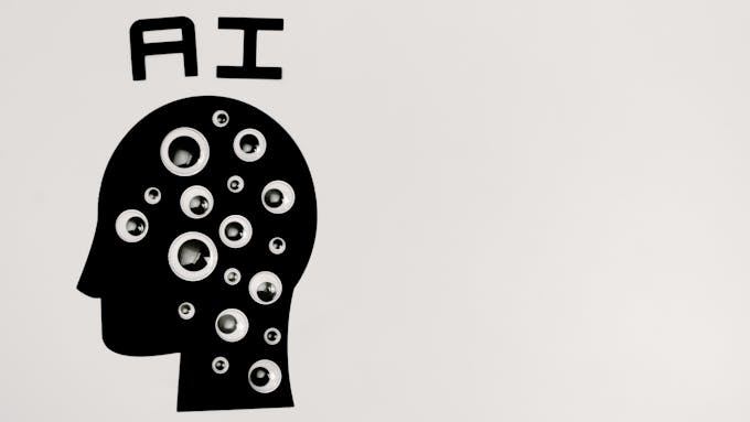 Abstract illustration of AI with silhouette head full of eyes, symbolizing observation and technology.